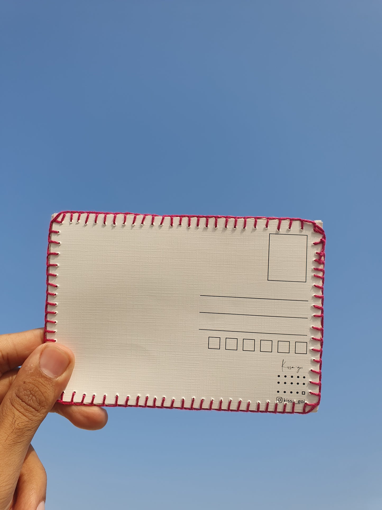 Back side of the hand-embroidered postcard showing the 225 gsm textured paper, ideal for writing with a ball pen