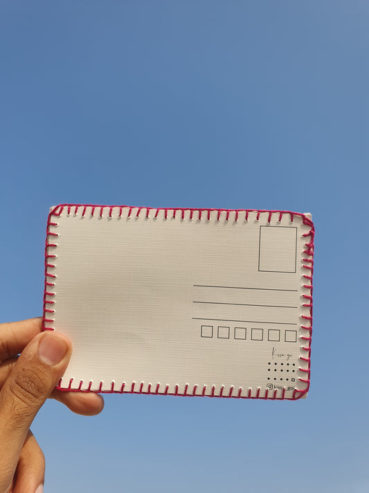 Back side of the hand-embroidered postcard showing the 225 gsm textured paper, ideal for writing with a ball pen