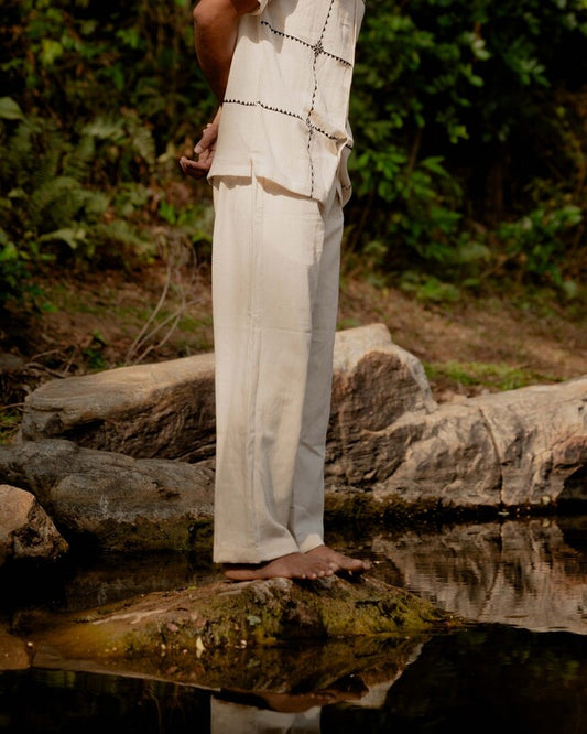 Side view of hand-woven kala cotton lounge pants