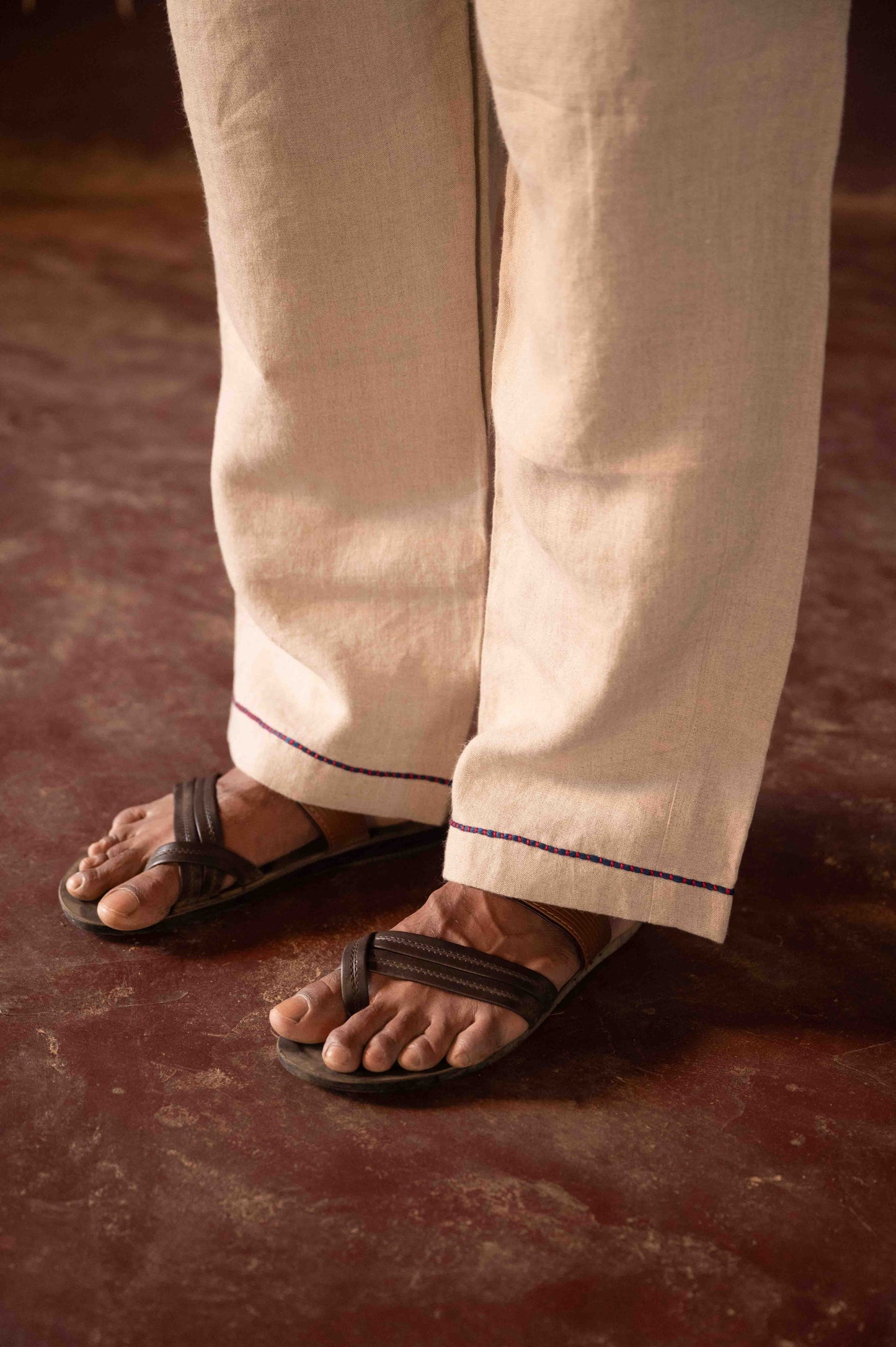standing look of the linen lounge pants with Embroidered Edges