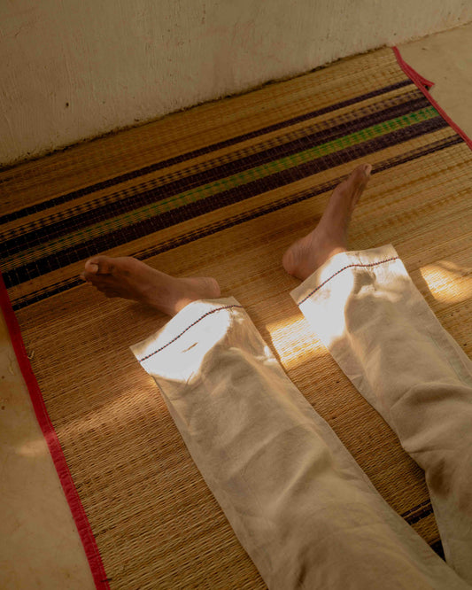 Close up of linen lounge pants with Embroidered Edges