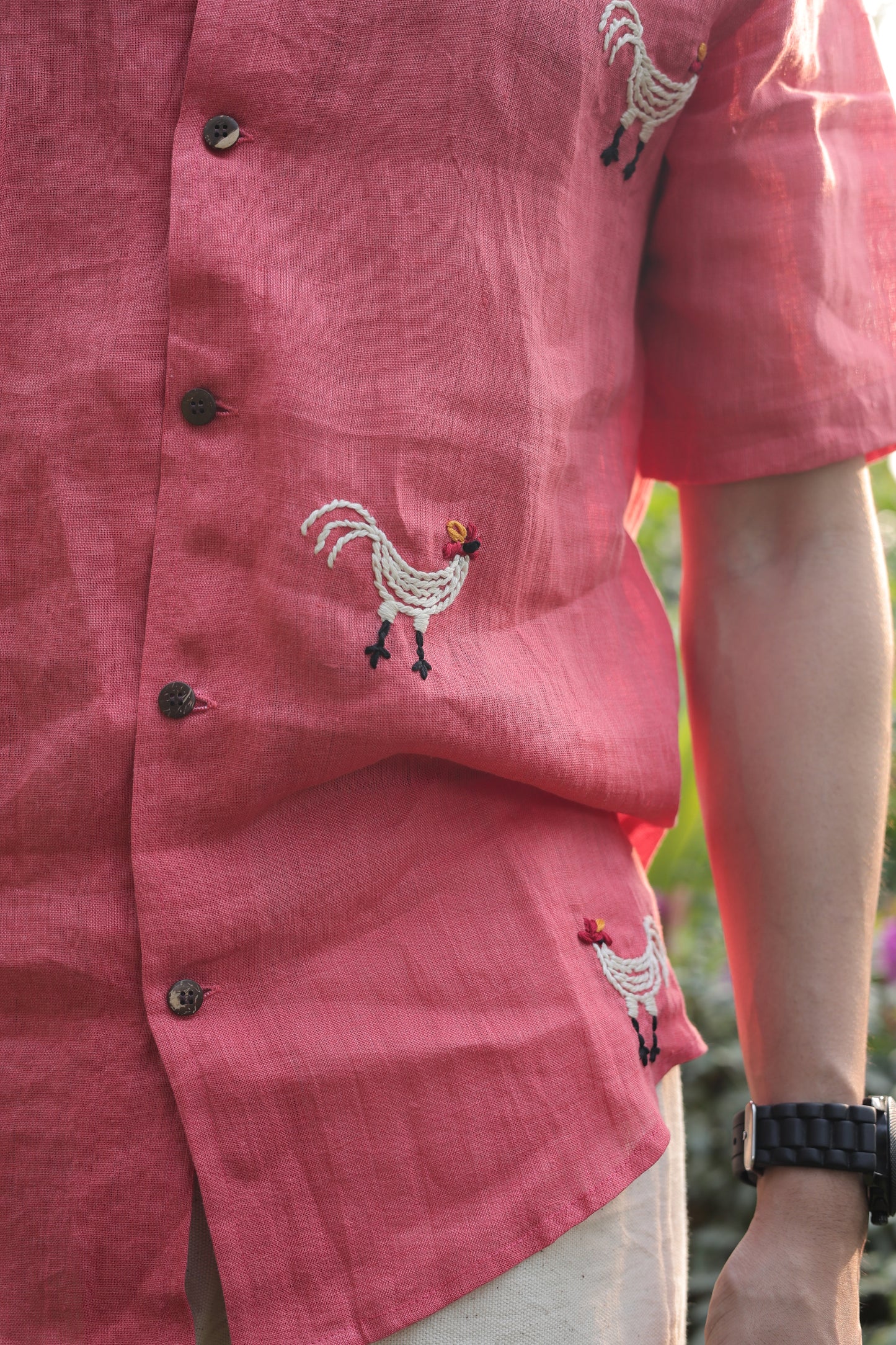 Roosters in red linen shirt