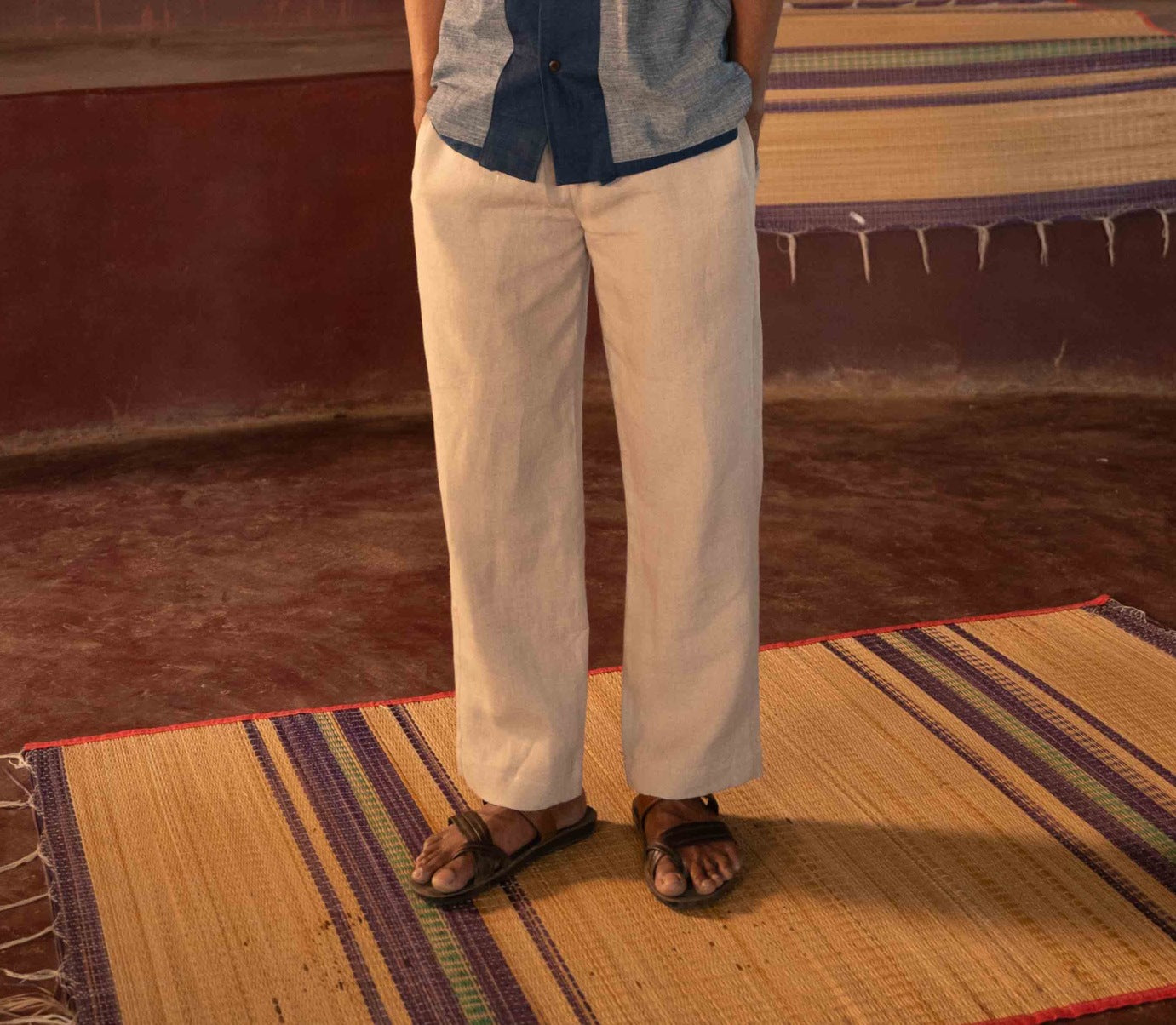 Model wearing beige linen lounge pants 