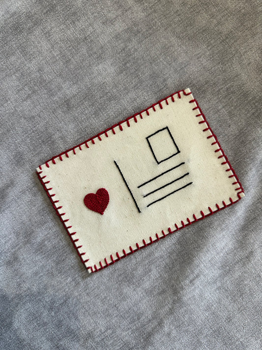 Postmarked with love postcard
