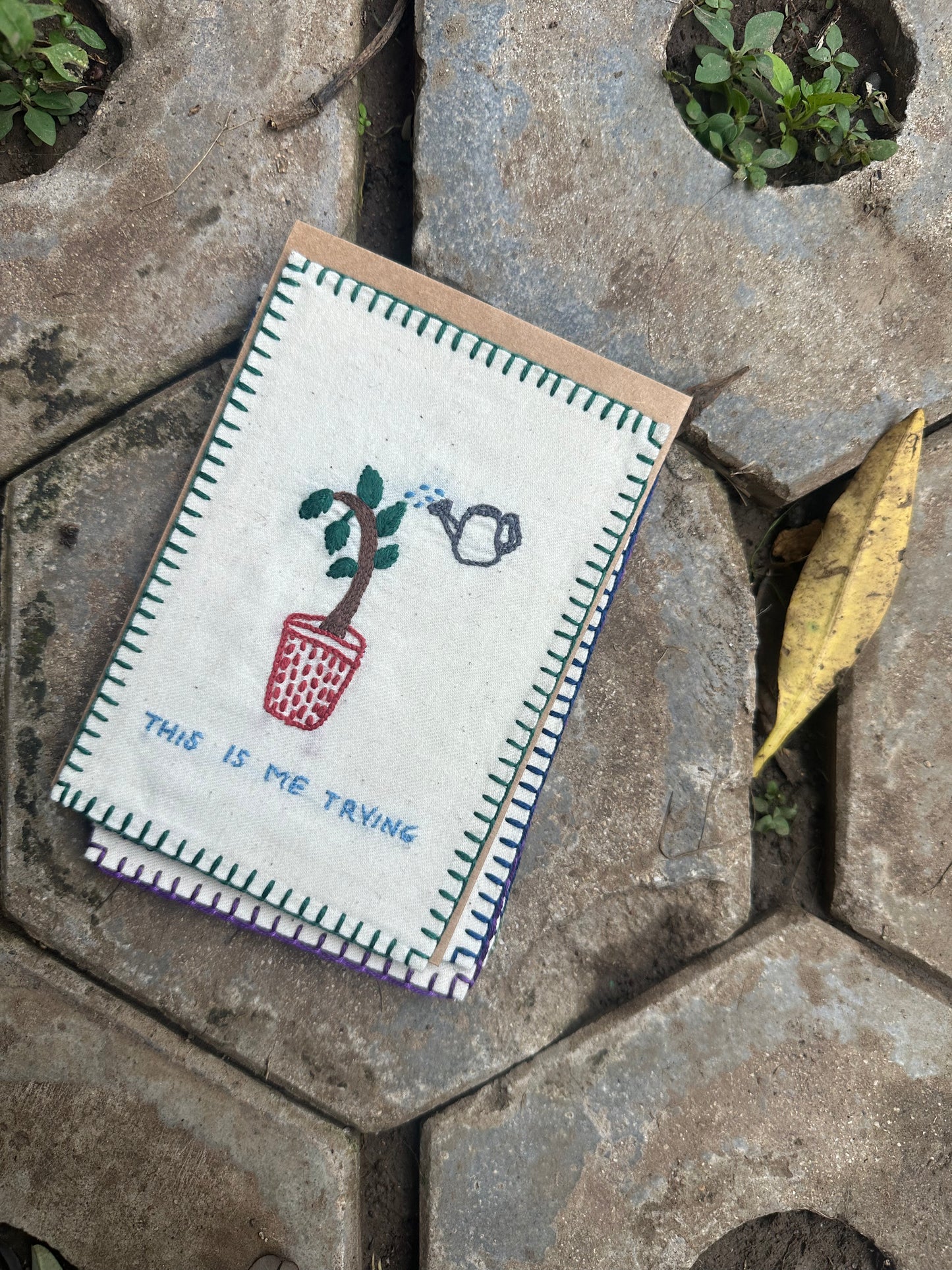 Small acts of hope hand-embroidered postcard